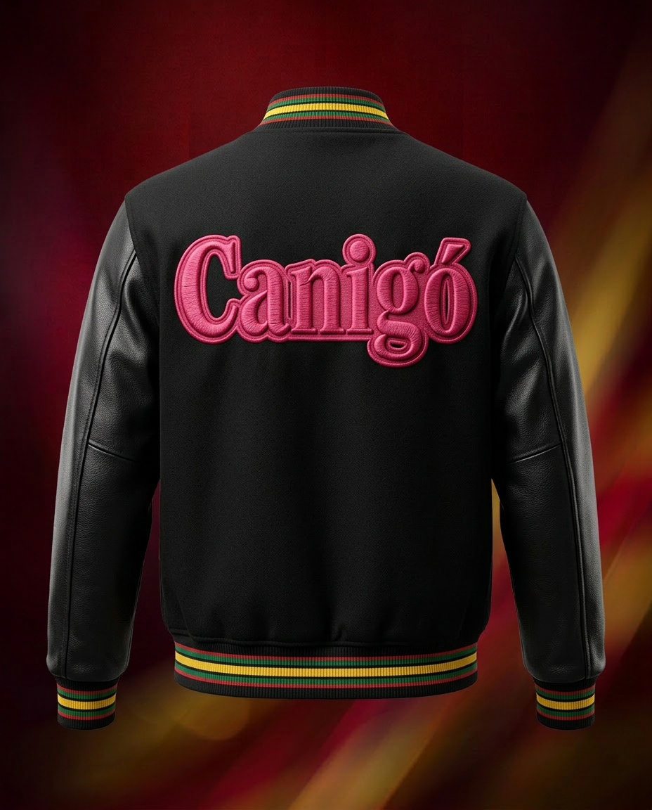 veste bomber noire Canigó vue de dos avec grand logo rose et bords côtes rayés rouge jaune vert